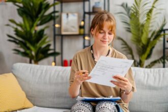 Where is the account number and routing number for the check?